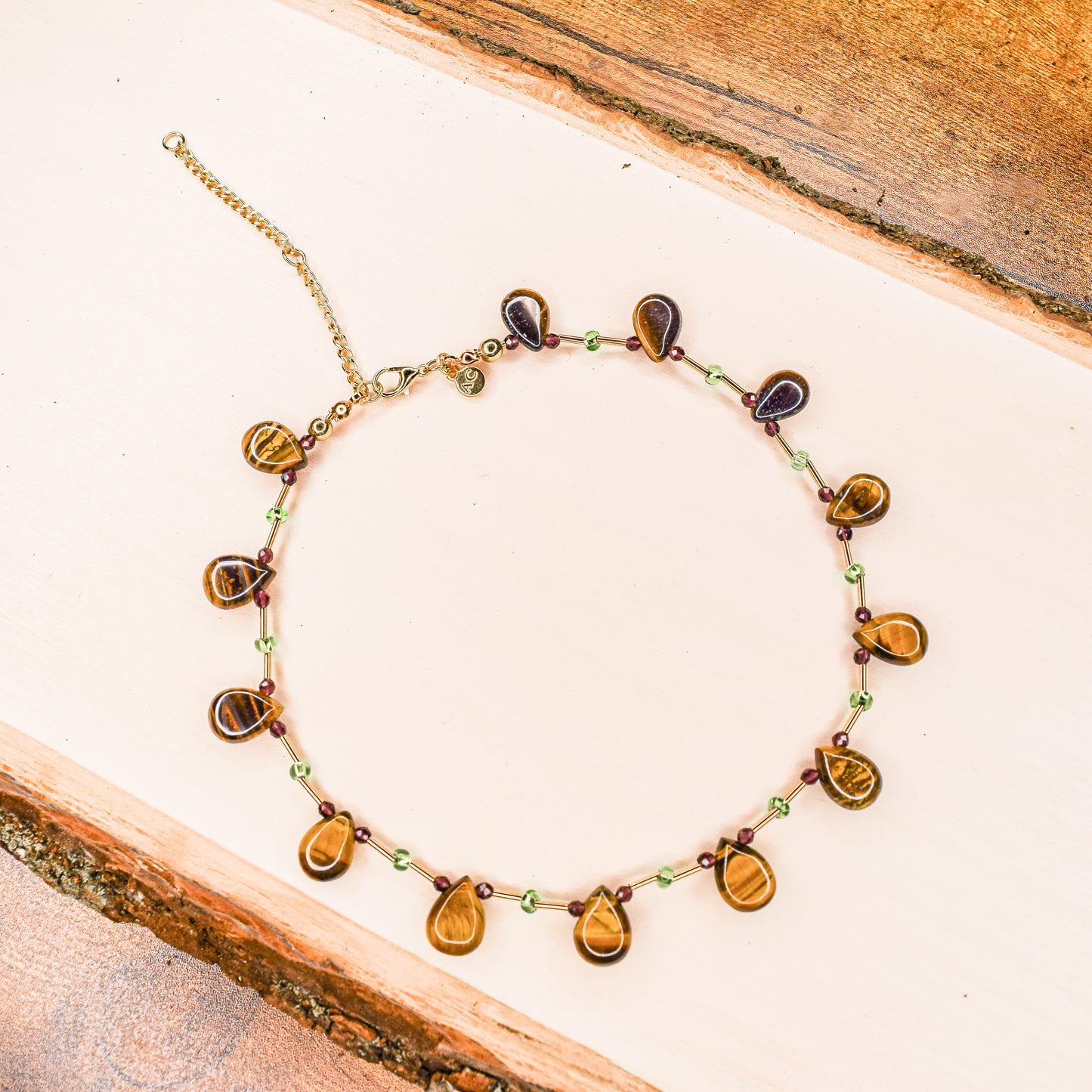 Handcrafted with tiger's eye teardrop & glass cube beads for elegant, refined style by Ayiti Chérie. Haitian-inspired, lifestyle brand