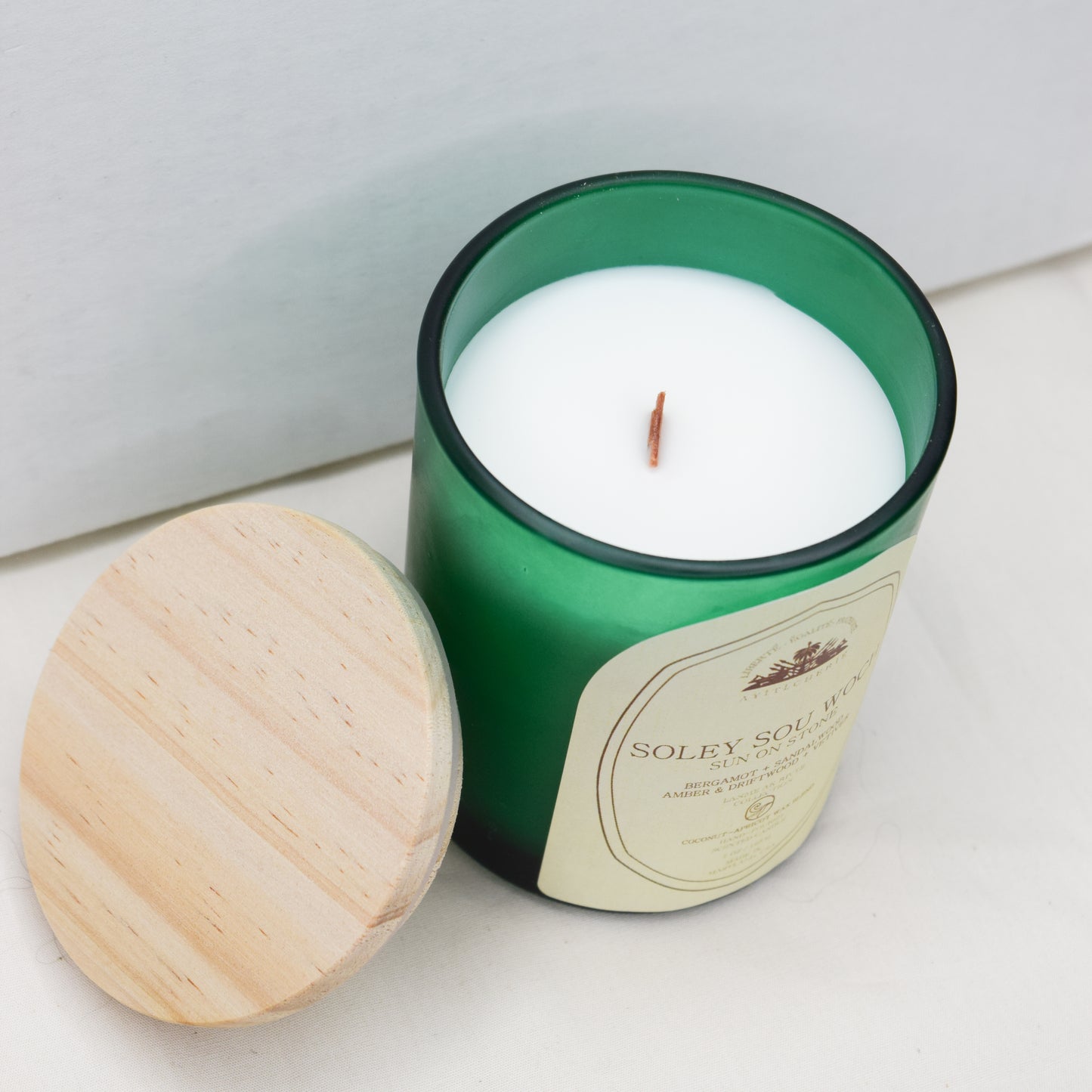 Soley Sou Woch_Sun On Stone_Bergamot _Sandalwood_Amber-Driftwood_Vetiver Candle by Ayiti Cherie
