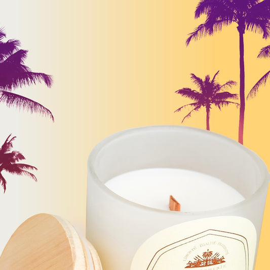 Haitian-inspired candle with passionfruit, pineapple, hibiscus palm, lemongrass lime, and vetiver by Ayiti Cherie
