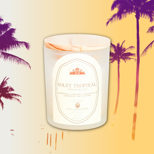 Haitian-inspired candle with passionfruit, pineapple, hibiscus palm, lemongrass lime, and vetiver by Ayiti Cherie