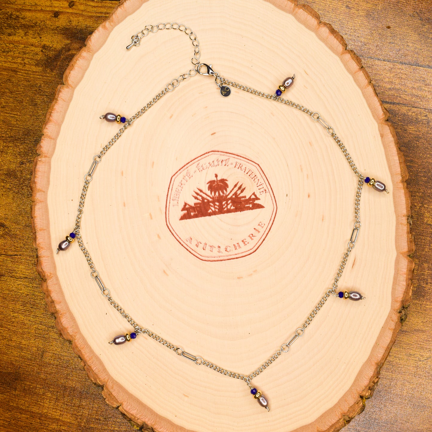 Handcrafted with silver curb & paper clip chain, featuring pearls & glass beads for elegant, refined style by Ayiti Chérie. Haitian-inspired, lifestyle brand