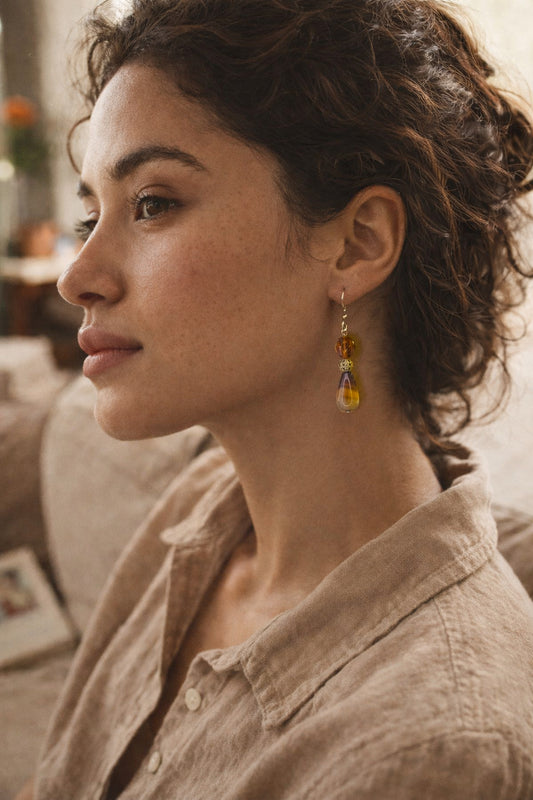 Handcrafted earrings- Agate teardrops, faceted glass & gold cage bead details for refined, modern elegance. Haitian-inspired, lifestyle brand