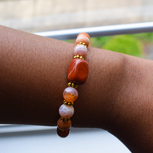 Handcrafted bracelet- Jasper and Fire Agate beads for refined, modern elegance. Haitian-inspired, lifestyle brand