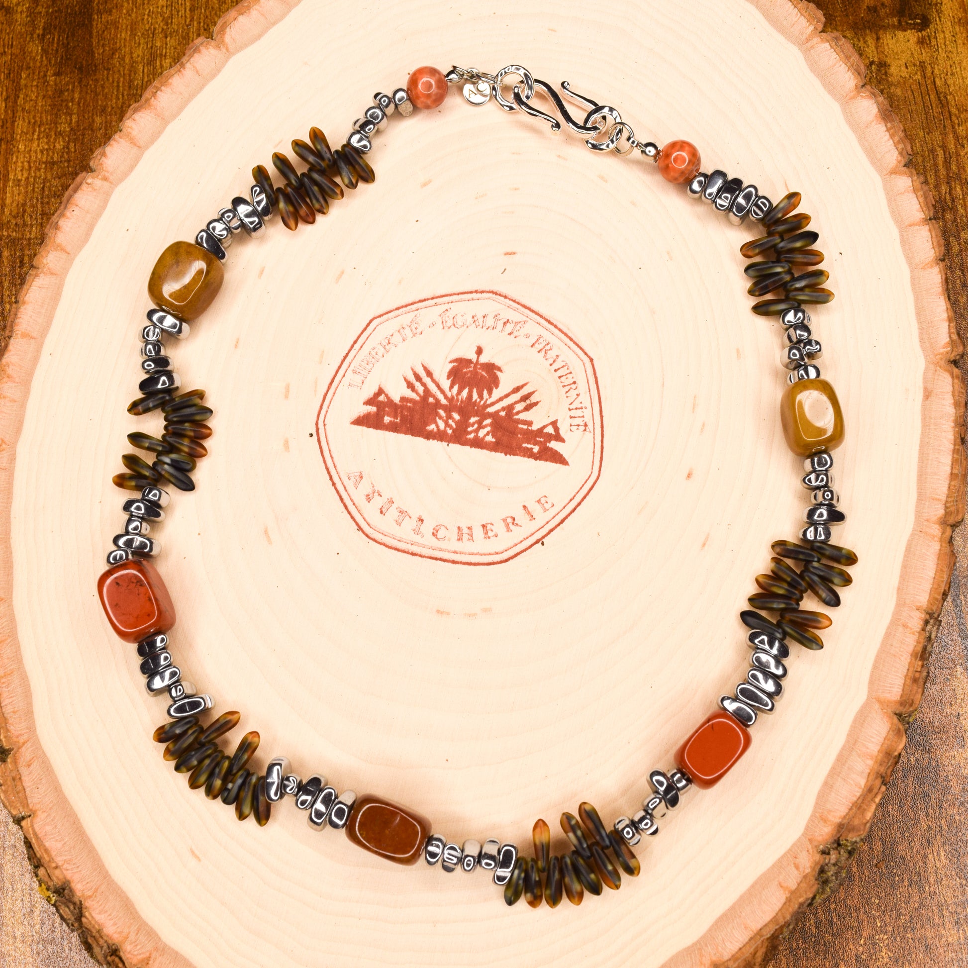Handcrafted with flex wire, featuring jasper, hematite, & glass beads for elegant, refined style by Ayiti Chérie. Haitian-inspired, lifestyle brand