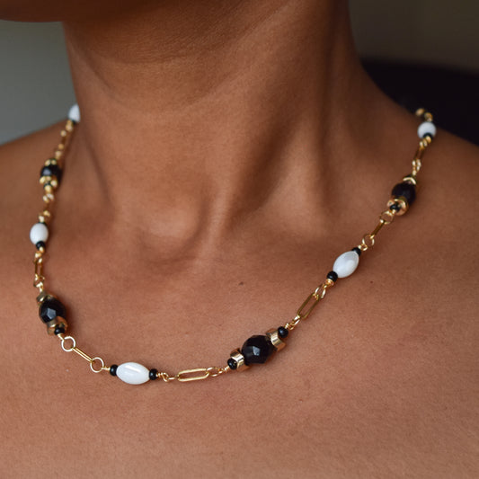 Handcrafted necklace- Mother-of-Pearl, hematite, & glass beads for refined, modern elegance. Haitian-inspired, lifestyle brand