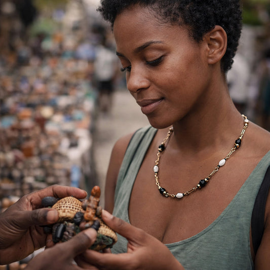 Handcrafted necklace- Mother-of-Pearl, hematite, & glass beads for refined, modern elegance. Haitian-inspired, lifestyle brand