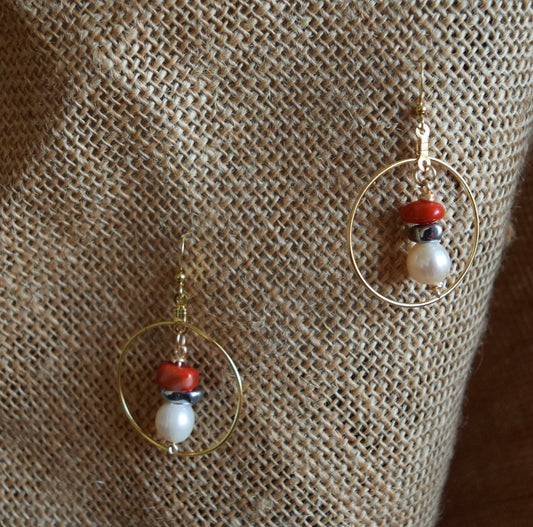 Handcrafted earrings with hematite, coral, and potatoe pearl beads for elegant, refined style by Ayiti Chérie. Haitian-inspired, lifestyle brand