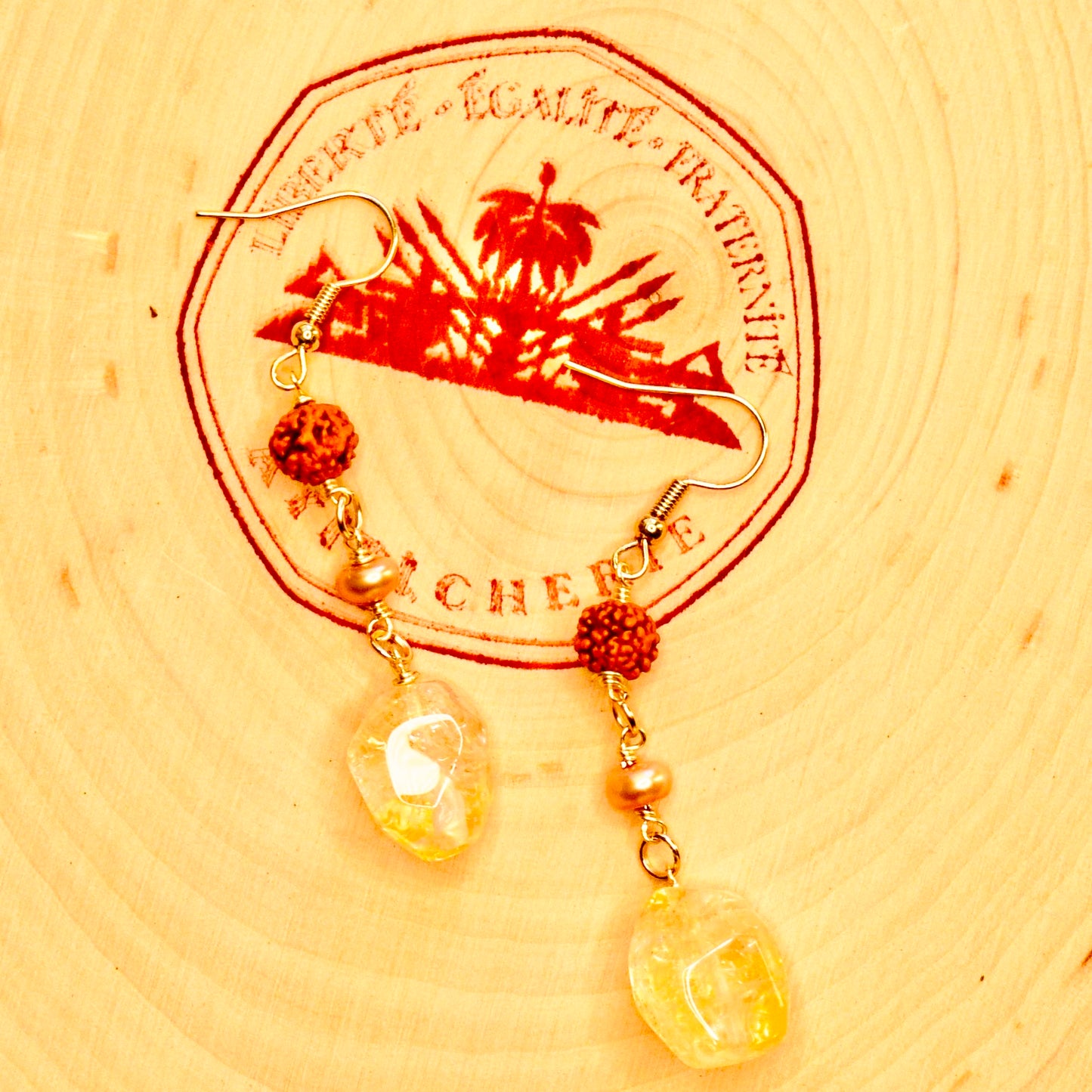 Handcrafted earrings with citrine, Rudraska, and pearl beads for elegant, refined style by Ayiti Chérie. Haitian-inspired, lifestyle brand