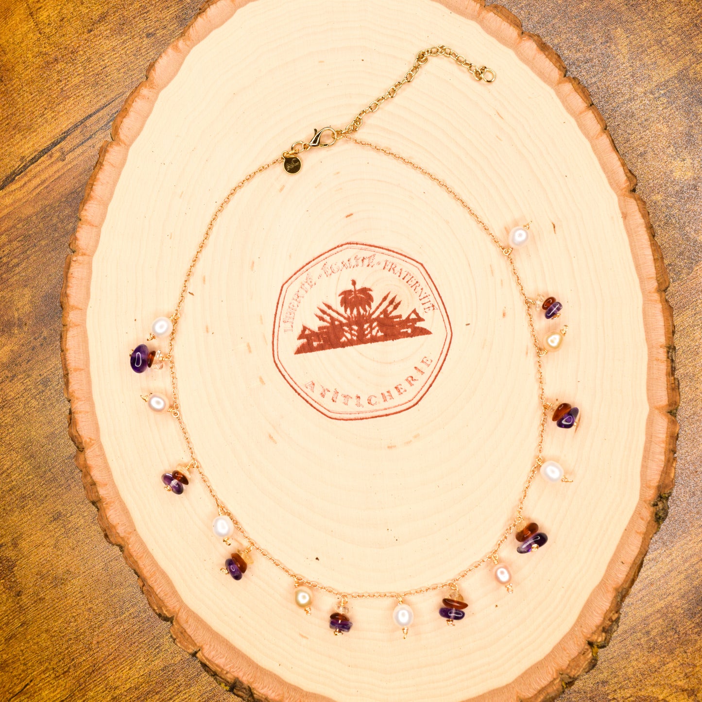 Handcrafted with delicate curb chain, featuring pearls, amethyst, & citrine for elegant, refined style by Ayiti Chérie. Haitian-inspired, lifestyle brand