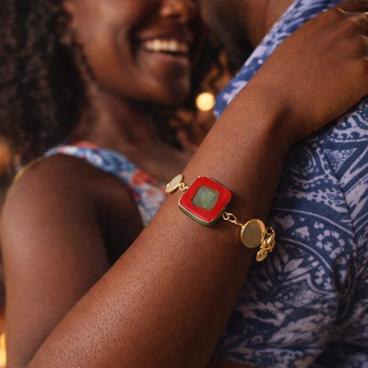 Handcrafted bracelet- Mosaic glass metal disc beads, and braided leather for refined, modern elegance. Haitian-inspired, lifestyle brand