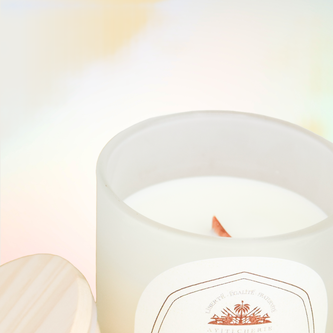 Rainbow candle with passionfruit and pineapple, neroli and white jasmine, sandalwood, and vetiver by Ayiti Cherie