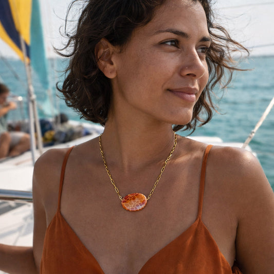 Handcrafted with 18K gold-plated paper clip chain, featuring fire agate stone for elegant & refined style by Ayiti Chérie. Haitian-inspired, lifestyle brand