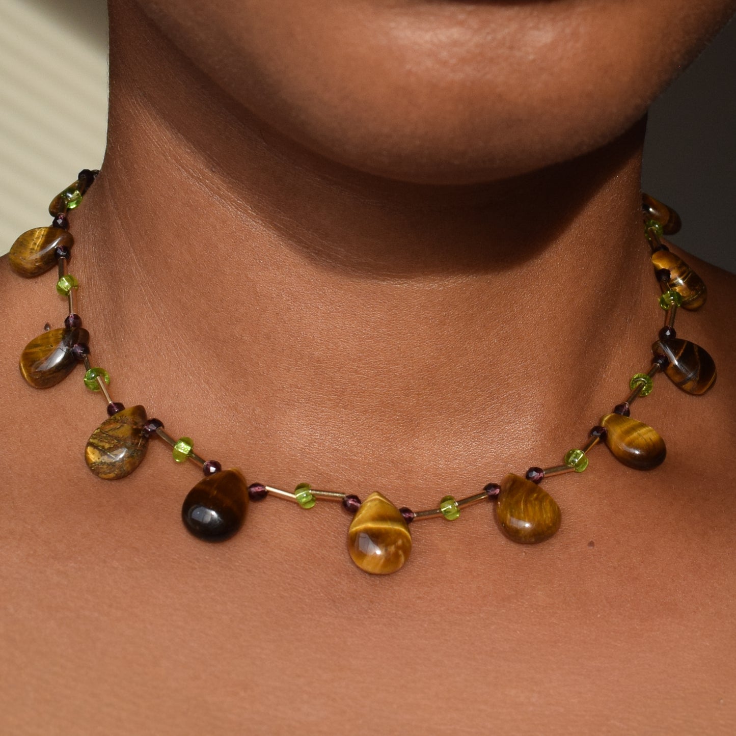 Handcrafted with tiger's eye teardrop & glass cube beads for elegant, refined style by Ayiti Chérie. Haitian-inspired, lifestyle brand