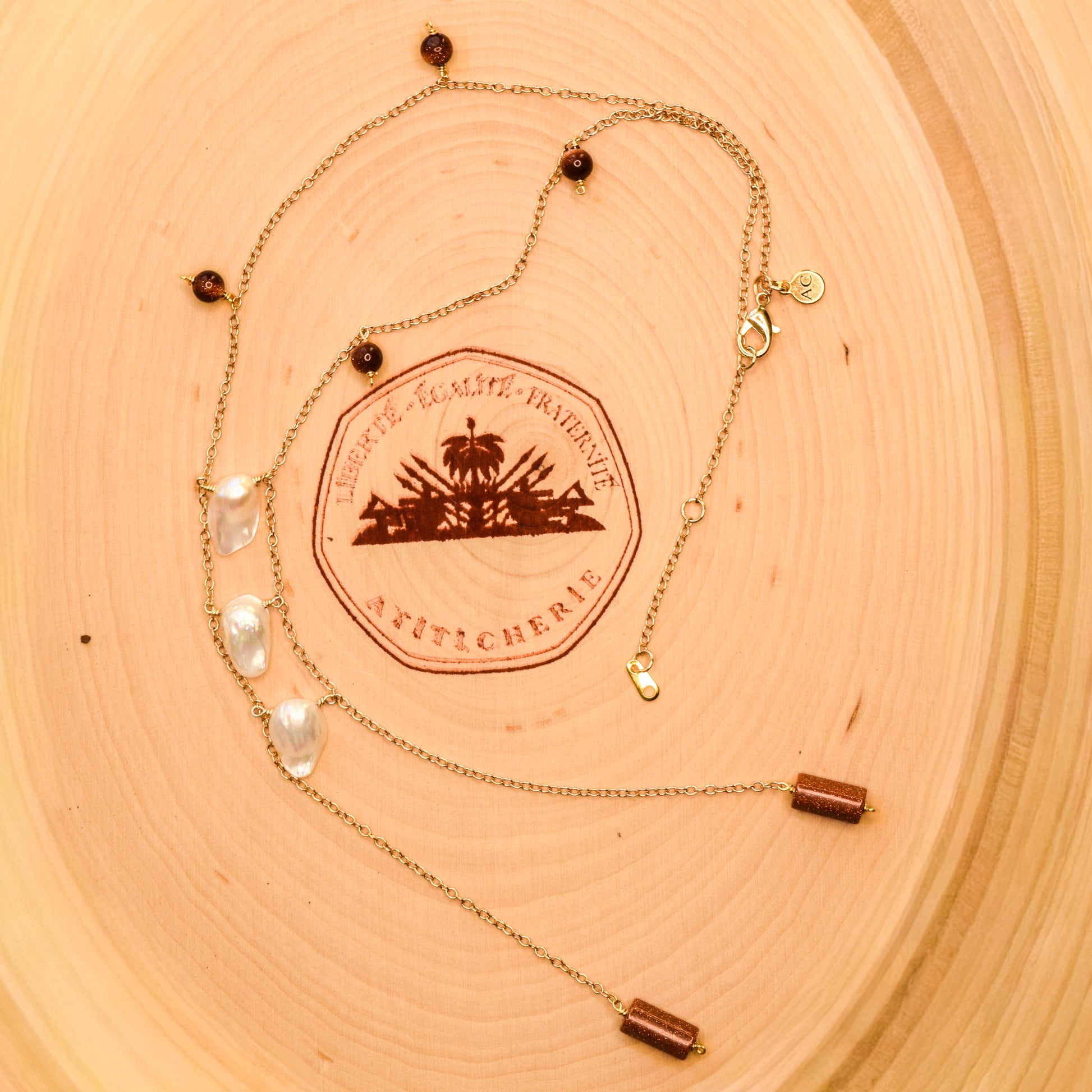 Handcrafted necklace with goldtone and Baroque pearl beads for elegant, refined style by Ayiti Chérie. Haitian-inspired, lifestyle brand