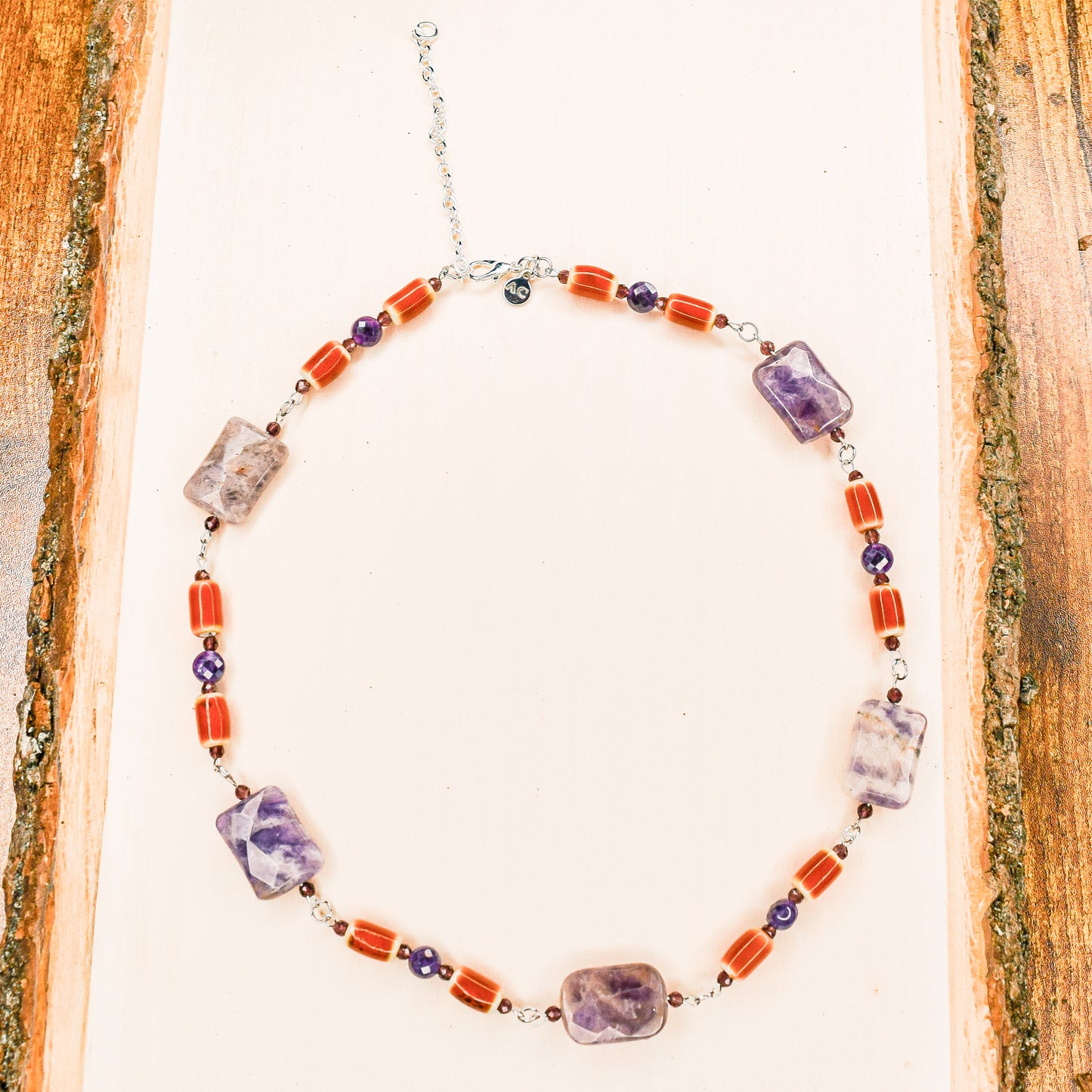 Handcrafted necklace- Amethyst and ceramic beads for refined, modern elegance. Haitian-inspired, lifestyle brand
