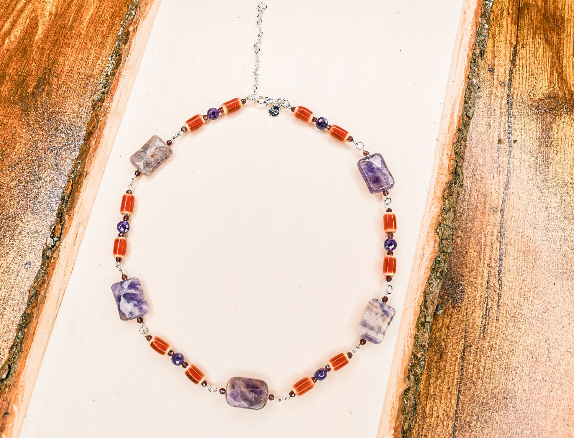 Handcrafted necklace- Amethyst and ceramic beads for refined, modern elegance. Haitian-inspired, lifestyle brand