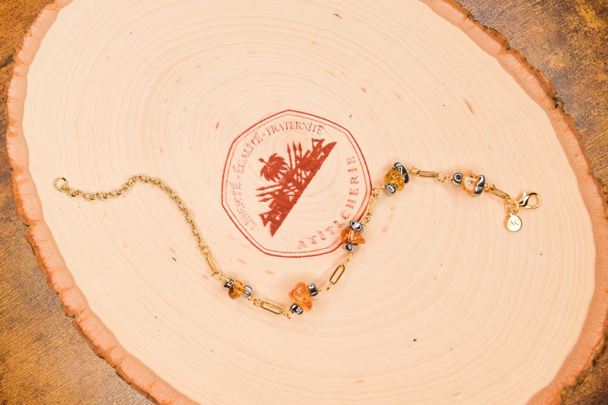 Handcrafted with 18K gold-plated paperclip chain, featuring citrine and hematite for elegant, refined style by Ayiti Chérie. Haitian-inspired, lifestyle brand