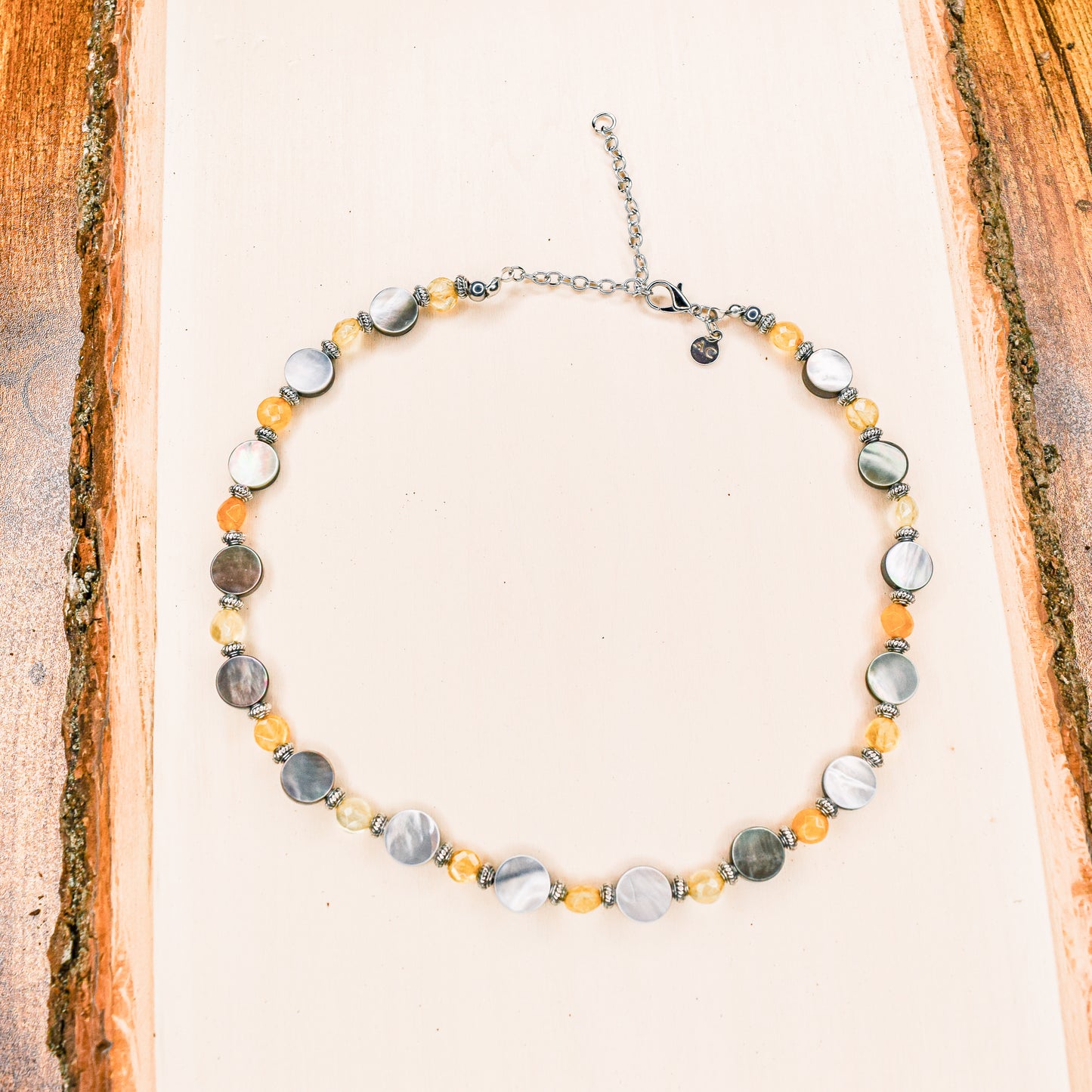 Handcrafted necklace- Black lentil and citrine beads for refined, modern elegance. Haitian-inspired, lifestyle brand