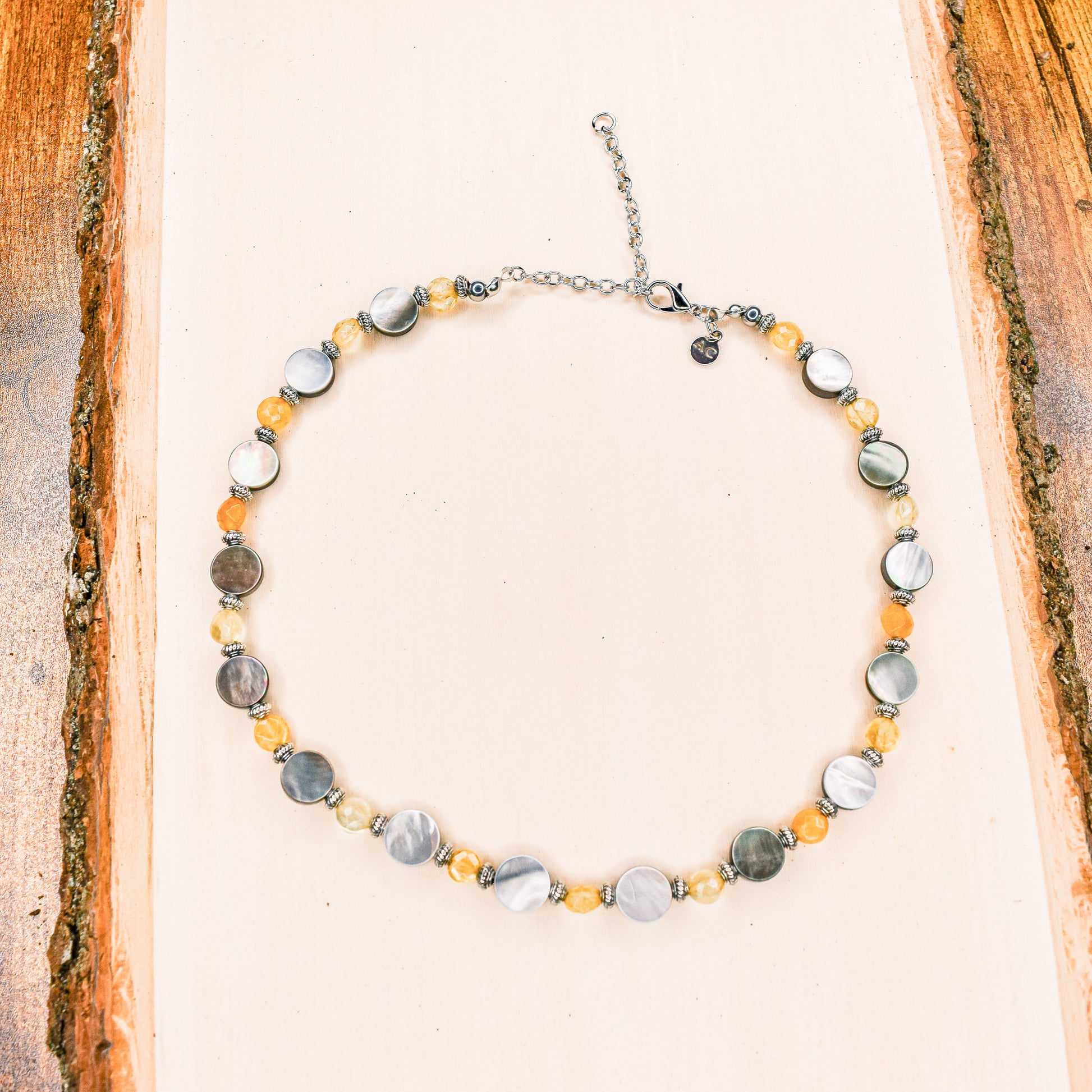 Handcrafted necklace- Black lentil and citrine beads for refined, modern elegance. Haitian-inspired, lifestyle brand
