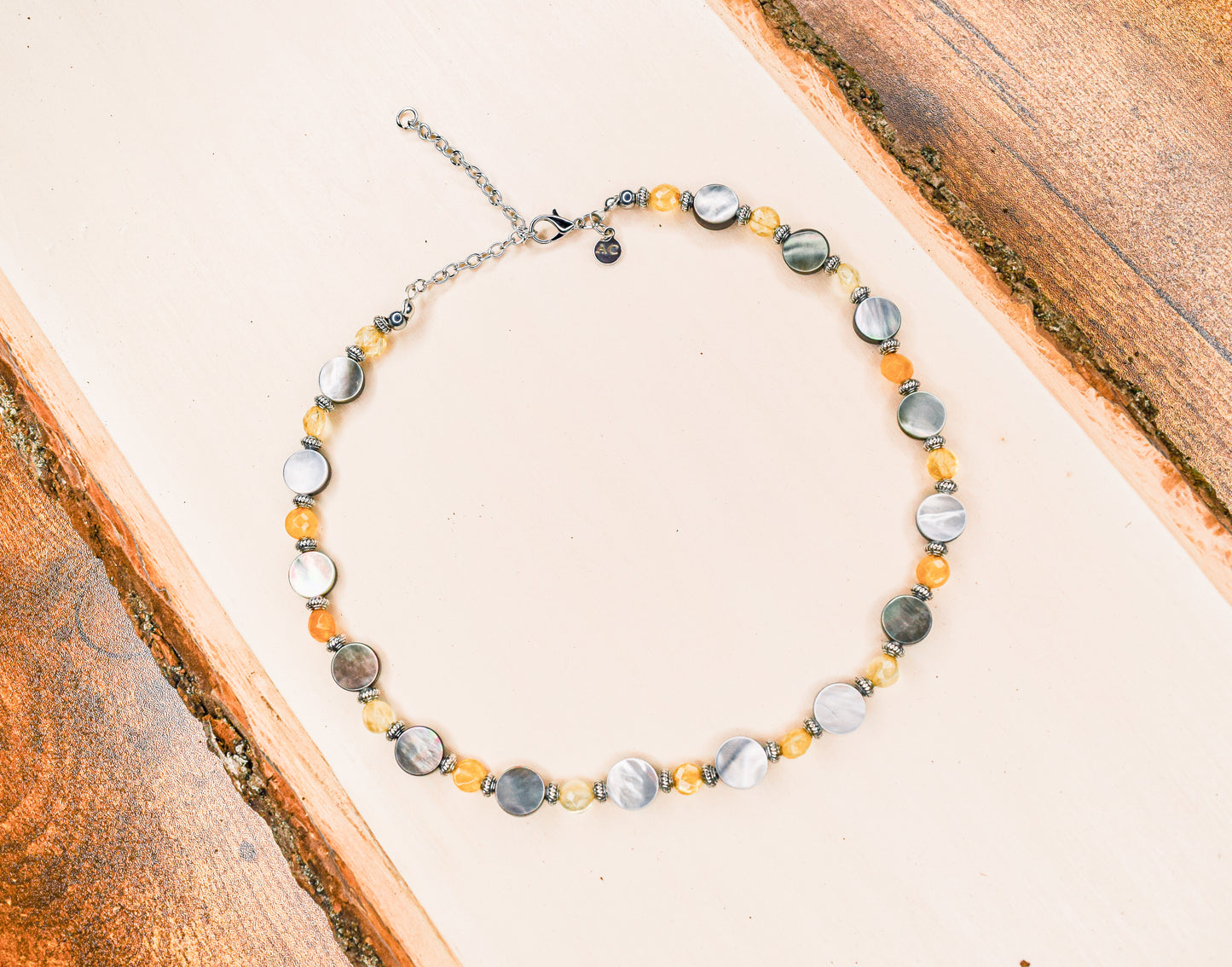 Handcrafted necklace- Black lentil and citrine beads for refined, modern elegance. Haitian-inspired, lifestyle brand