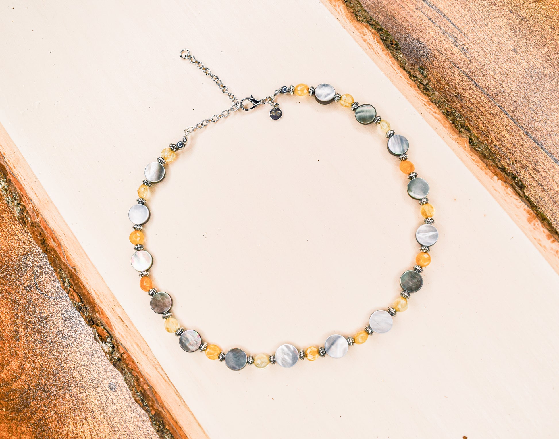 Handcrafted necklace- Black lentil and citrine beads for refined, modern elegance. Haitian-inspired, lifestyle brand