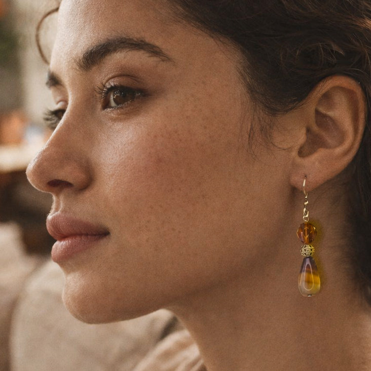 Handcrafted earrings- Agate teardrops, faceted glass & gold cage bead details for refined, modern elegance. Haitian-inspired, lifestyle brand