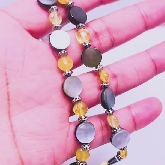 Handcrafted necklace- Black lentil and citrine beads for refined, modern elegance. Haitian-inspired, lifestyle brand