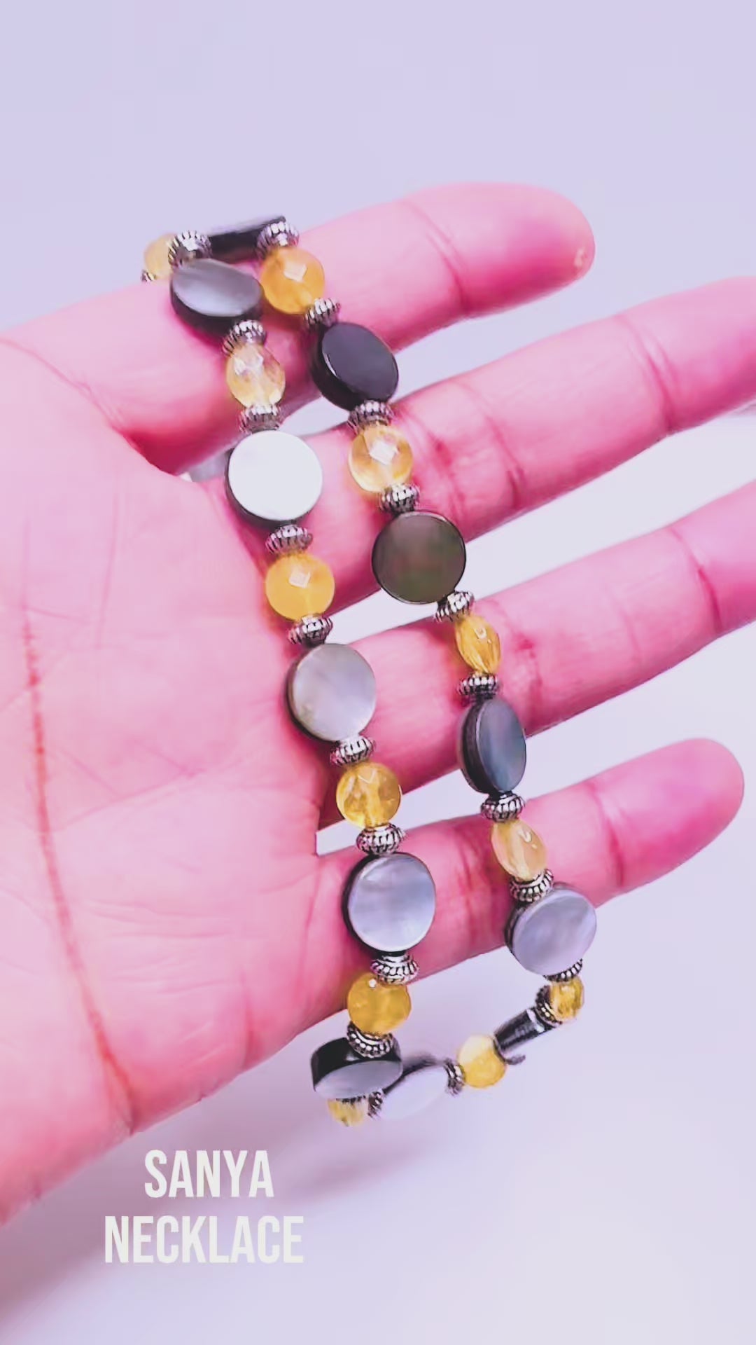 Handcrafted necklace- Black lentil and citrine beads for refined, modern elegance. Haitian-inspired, lifestyle brand
