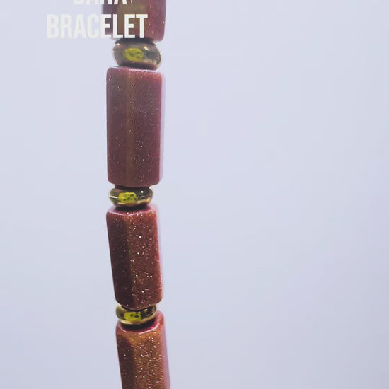 Handcrafted with goldstone & metal beads for elegant, refined style by Ayiti Chérie. Haitian-inspired, lifestyle brand