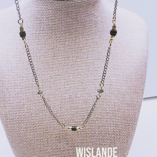 Handcrafted with delicate curb chain, featuring drum and bicone metal beads for elegant, refined style by Ayiti Chérie. Haitian-inspired, lifestyle brand