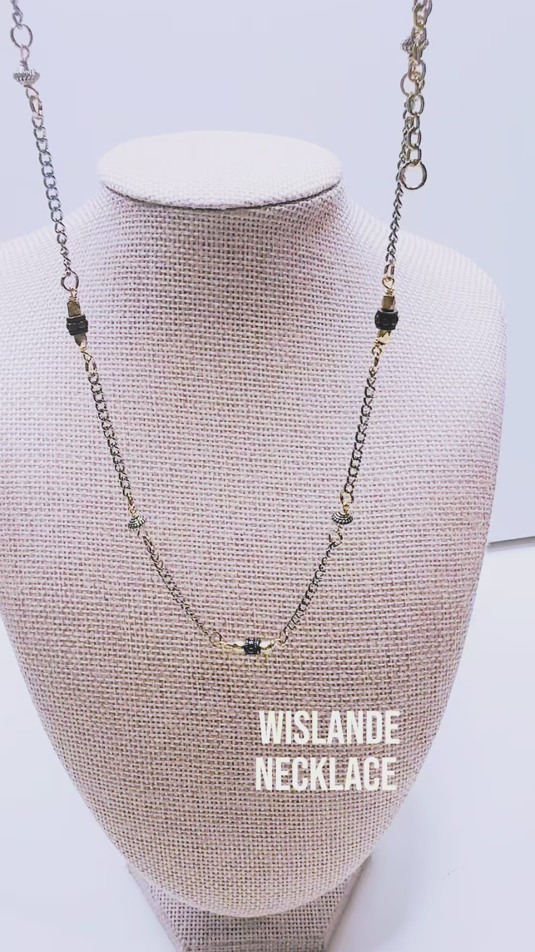 Handcrafted with delicate curb chain, featuring drum and bicone metal beads for elegant, refined style by Ayiti Chérie. Haitian-inspired, lifestyle brand