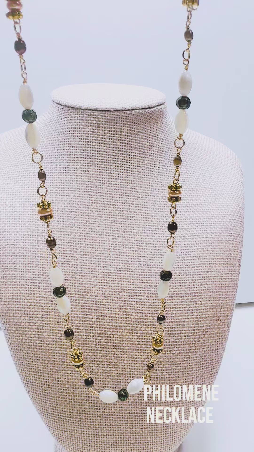 Handcrafted with mother-of-pearl, plated pyrite, and labradorite, for modern, refined elegance by Ayiti Chérie. Haitian-inspired, lifestyle brand