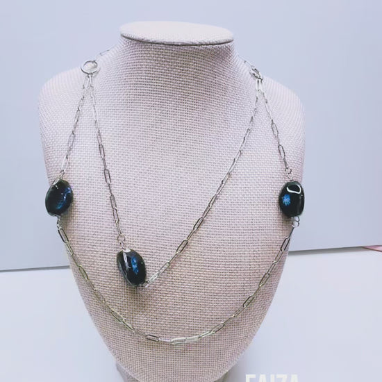 Handcrafted with silver paper-clip chain featuring twisted oval ceramic beads for elegant, refined style by Ayiti Chérie. Haitian-inspired, lifestyle brand