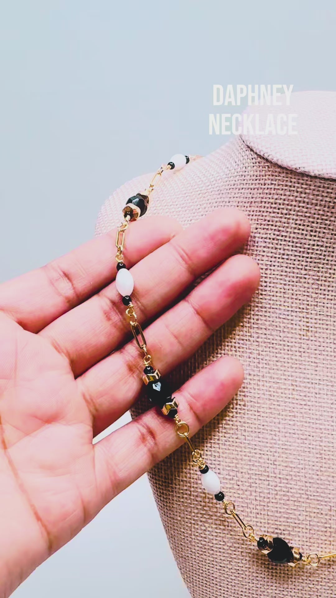 Handcrafted necklace- Mother-of-Pearl, hematite, & glass beads for refined, modern elegance. Haitian-inspired, lifestyle brand